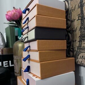 Louis Vuitton boxes.  Slide out drawer.  Smaller boxes.  Authentic